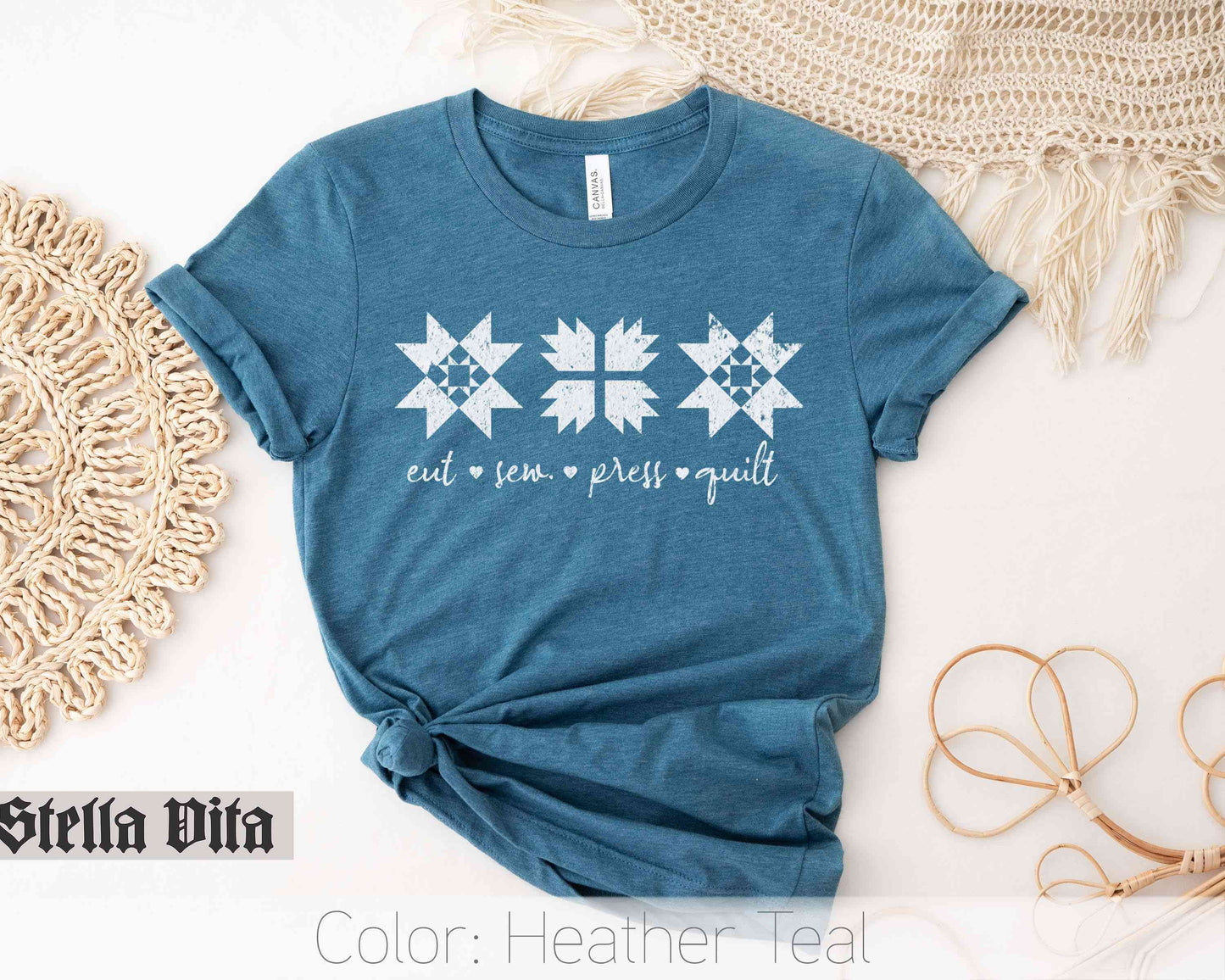 a blue t - shirt with white snowflakes on it