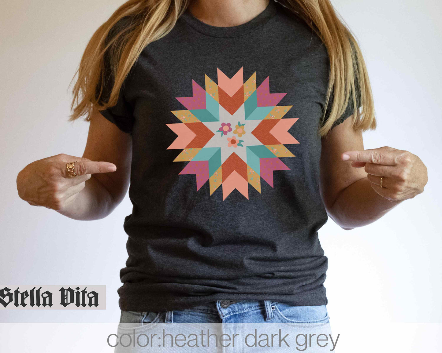 a woman wearing a t - shirt with a star design on it