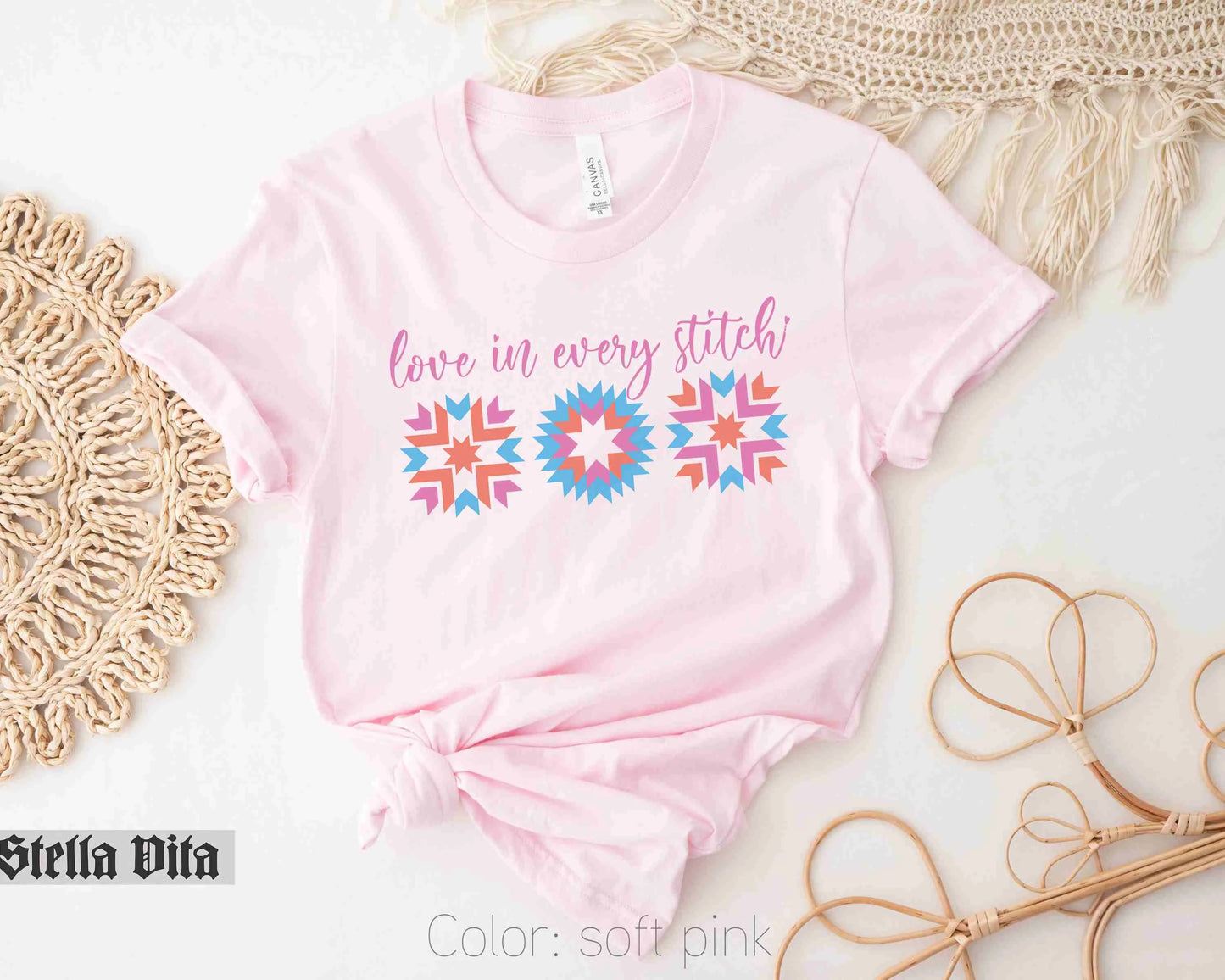 a pink shirt that says love in every stitch