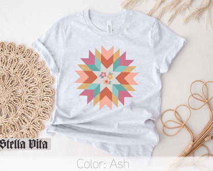 a t - shirt with a colorful flower on it