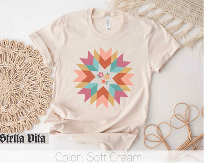 a t - shirt with a colorful star design on it