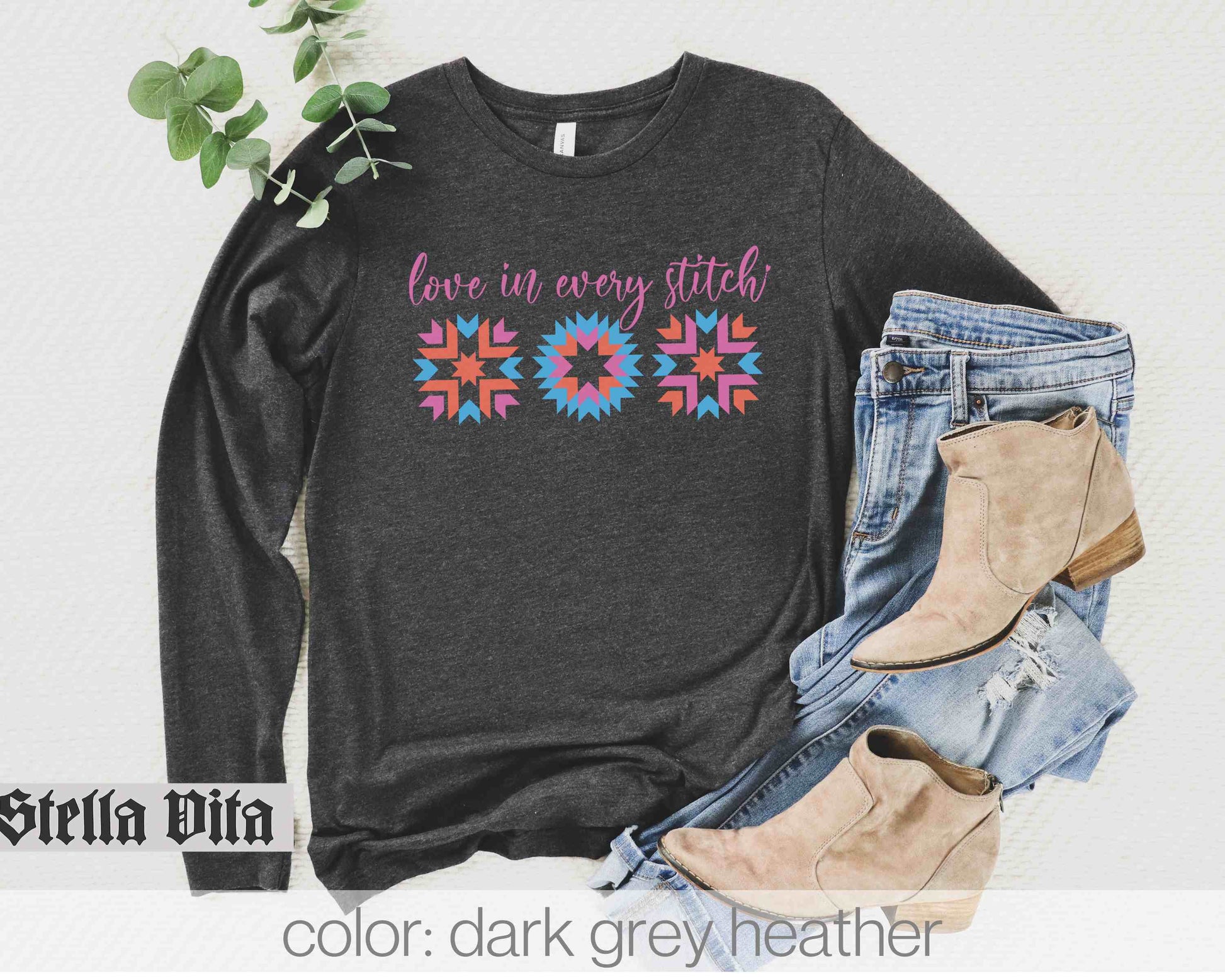 a t - shirt with the words love in many stitches on it