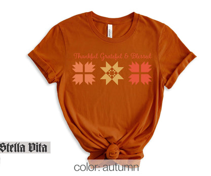 a t - shirt with a design on the front of it