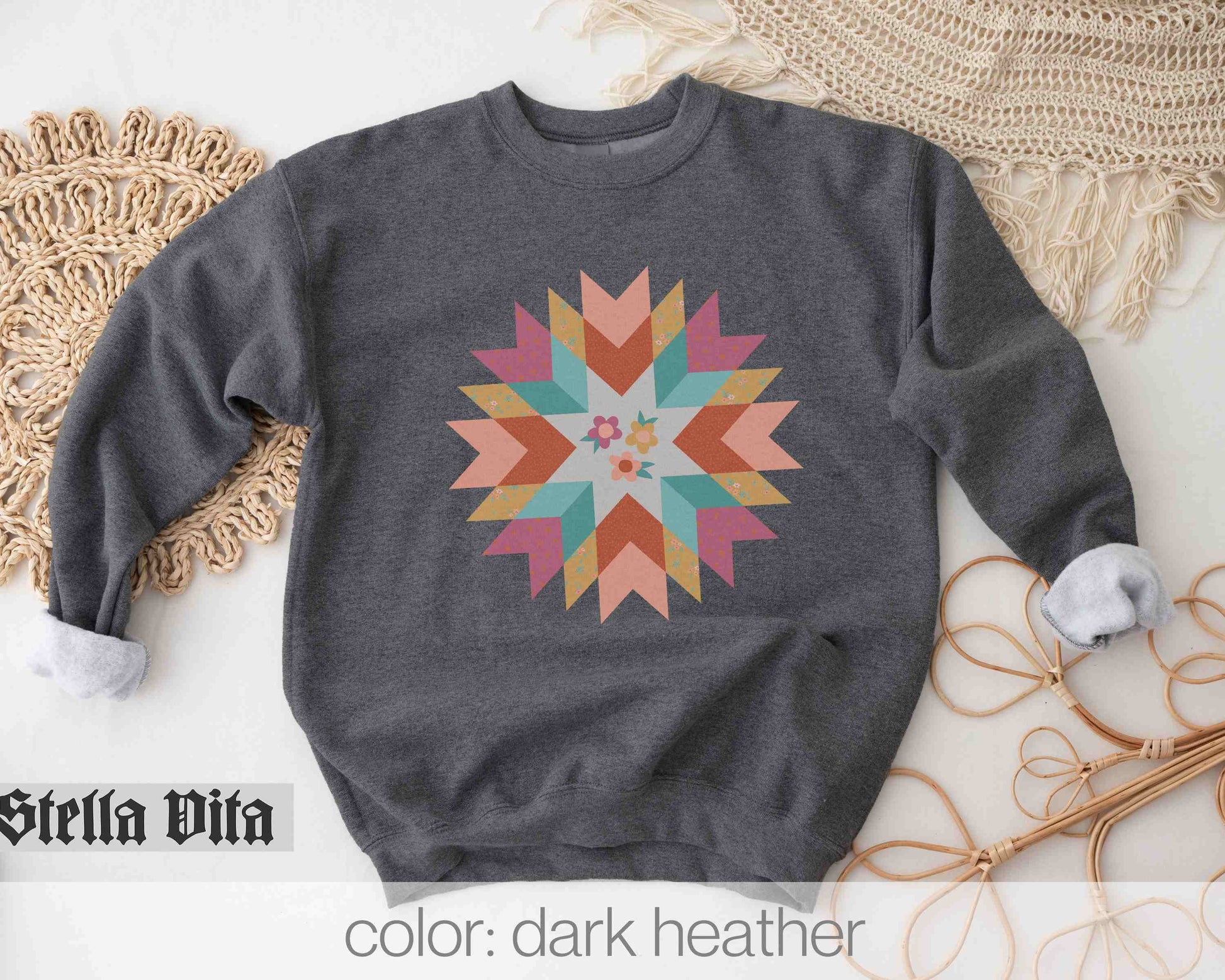 a sweater with a colorful star design on it